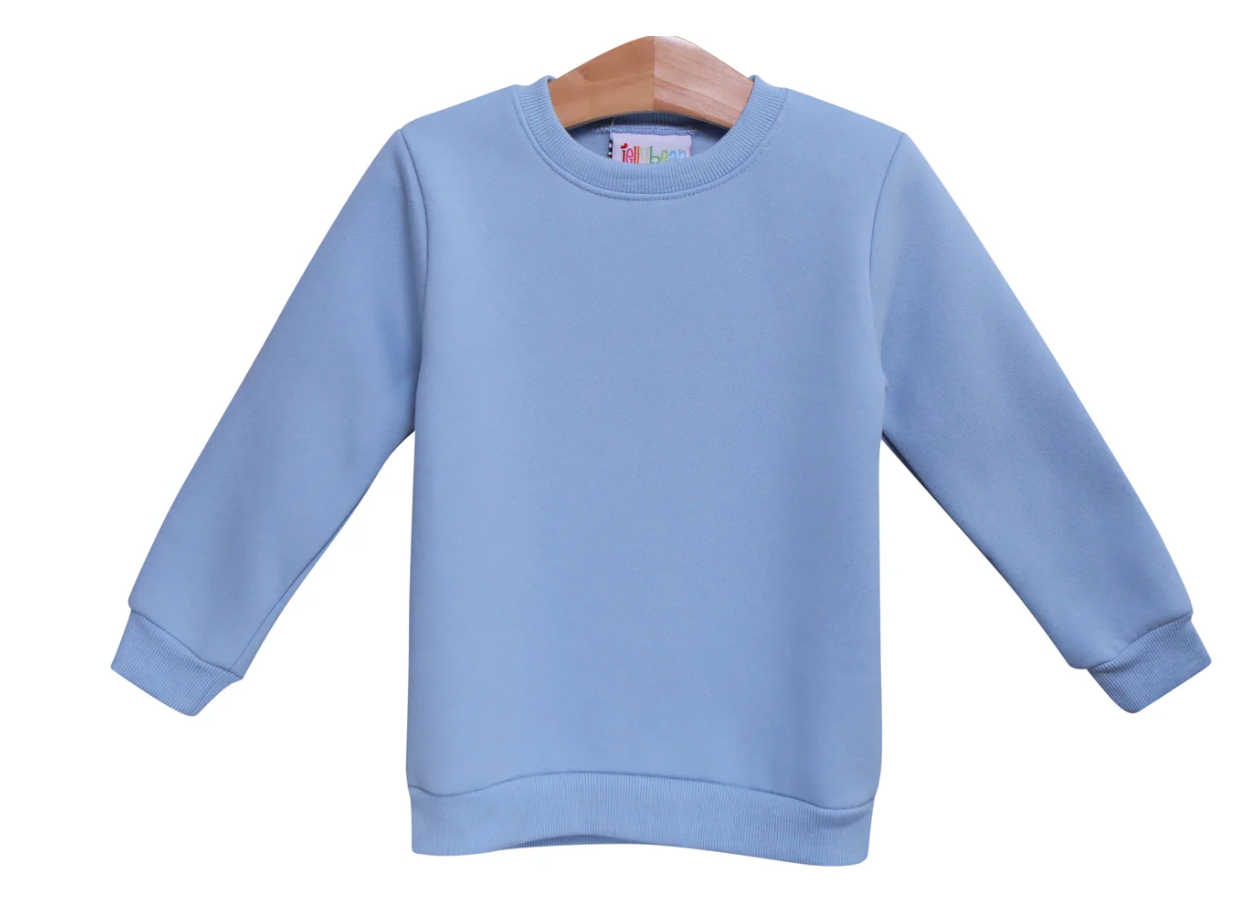 Light blue sweatshirt on a wooden hanger against a white background